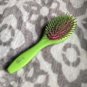 Mini travel sized hair brush comb